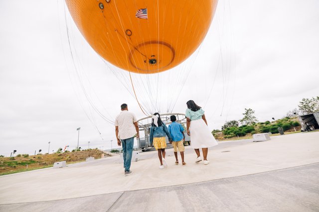 family at great park balloon entrance