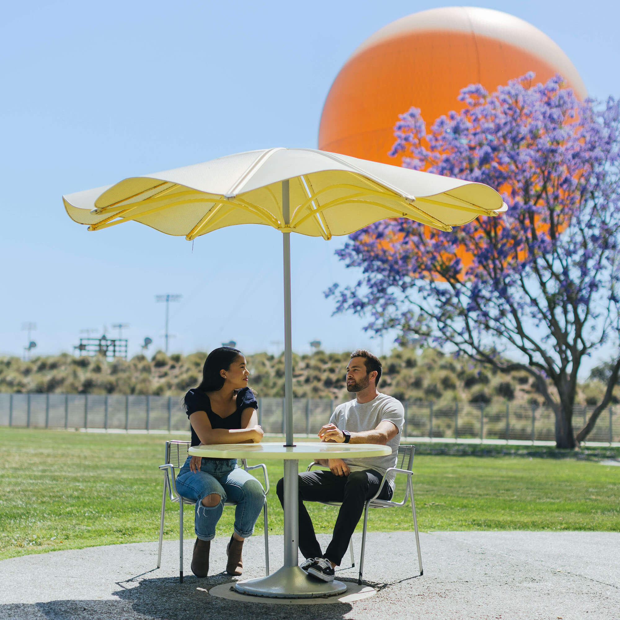 couple at great park with balloon