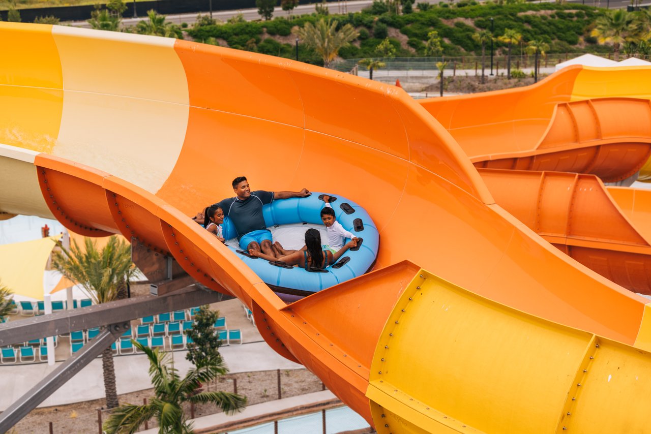 family on water slide at wild rivers water park irvine