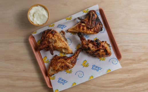 plate of chicken with dip