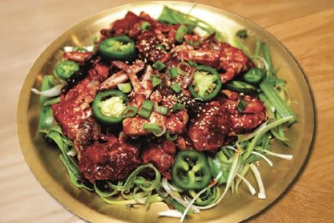 a plate of spicy raw crab at its tofu restaurant in irvine