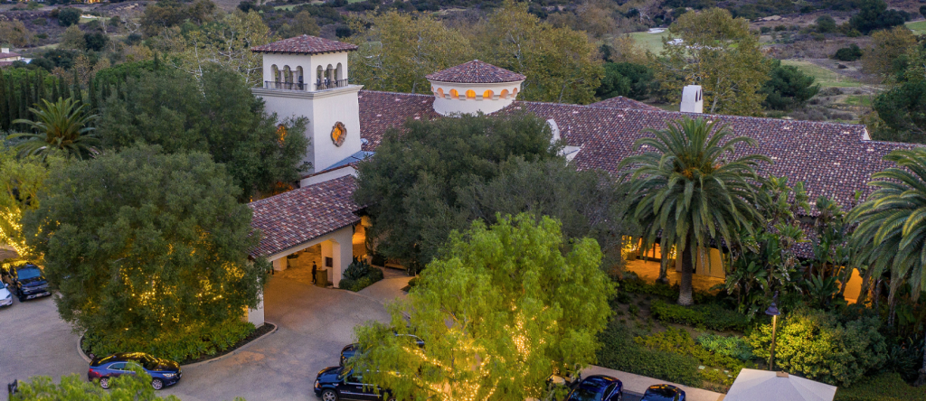 aerial view of shady canyon golf course clubhouse with santa barbara architecture